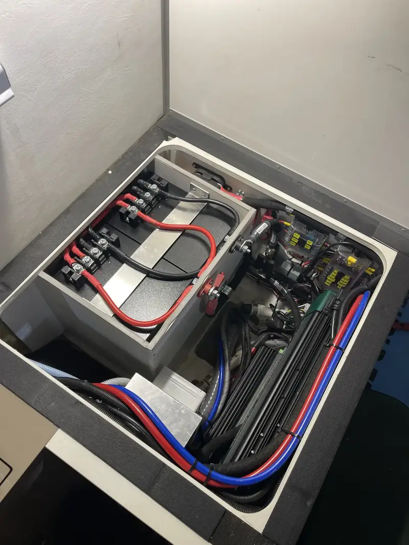 Custom battery cable routing and harness